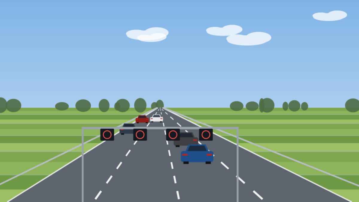 Schilderbrücke über einer vierspurigen Autobahn mit runden Tempoanzeigen und einem roten Kreuz