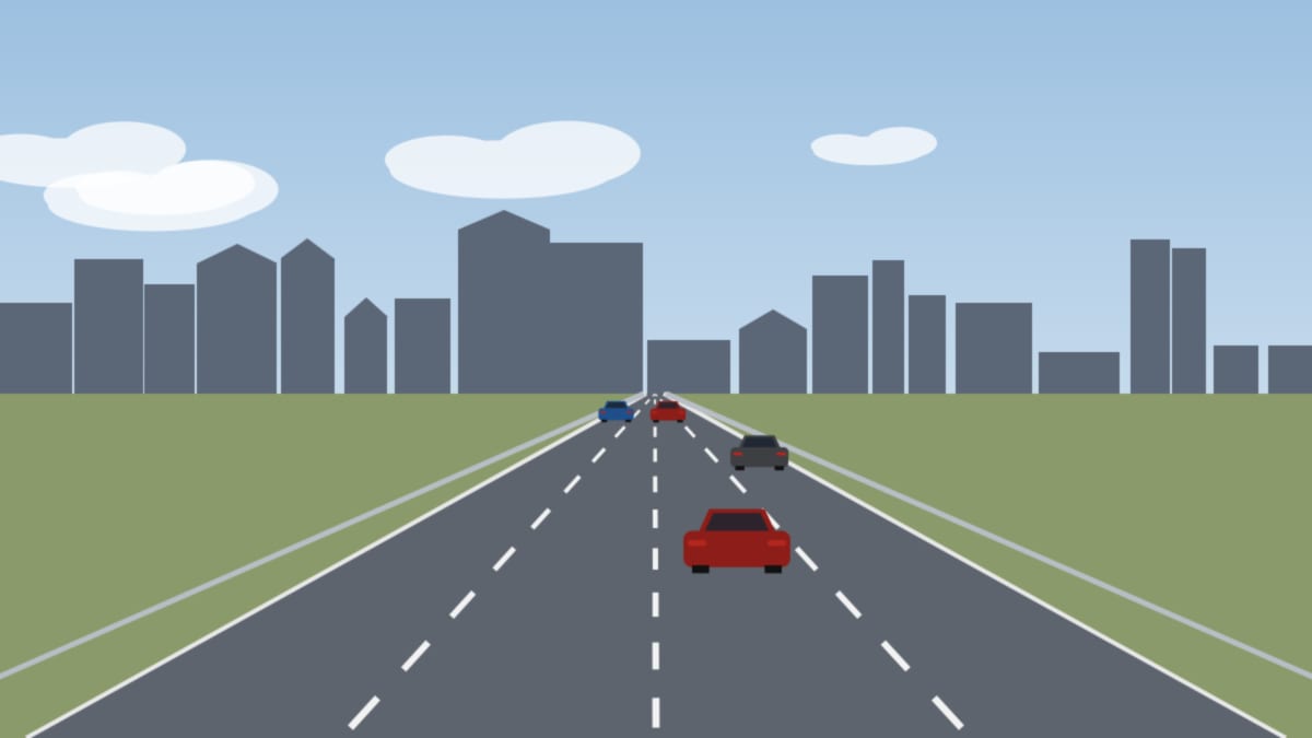 Stadtautobahn mit vier Fahrstreifen vor einer Silhouette aus Wohn- und Bürogebäuden